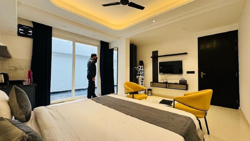 Imagen de la habitación del Hotel Reebah Inn and Suites, Gurugram. Foto 13