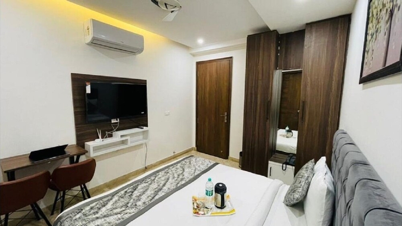 Imagen de la habitación del Hotel Reebah Inn and Suites, Gurugram. Foto 15