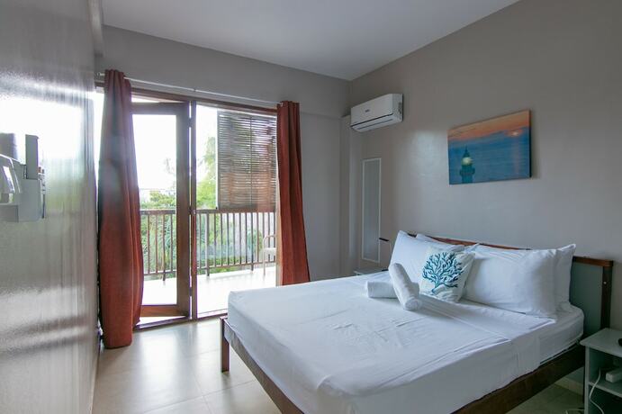 Imagen de la habitación del Hotel Reef Beach Resort. Foto 11