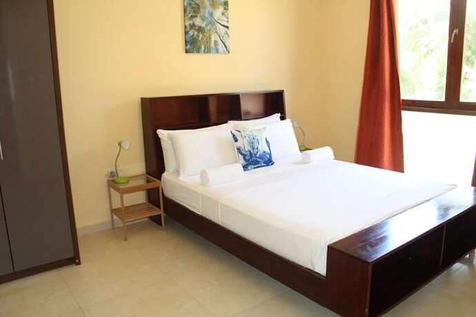 Imagen de la habitación del Hotel Reef Beach Resort. Foto 12