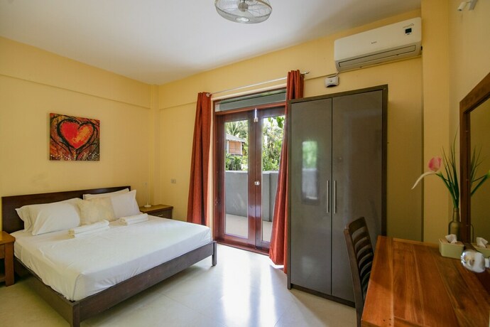 Imagen de la habitación del Hotel Reef Beach Resort. Foto 18