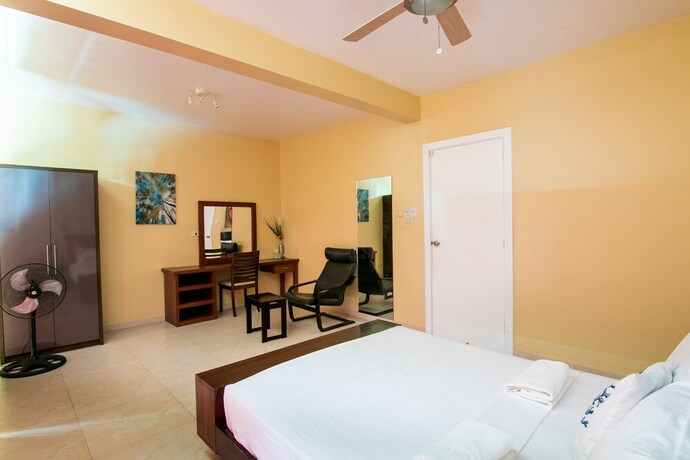 Imagen de la habitación del Hotel Reef Beach Resort. Foto 20