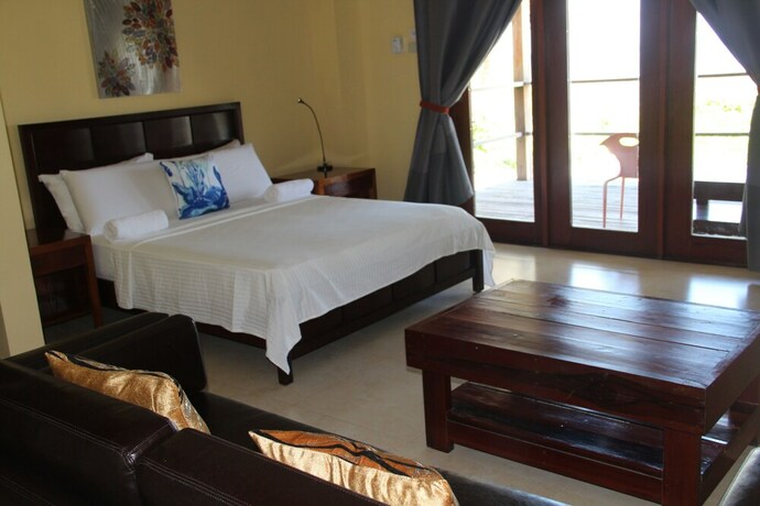 Imagen de la habitación del Hotel Reef Beach Resort. Foto 26