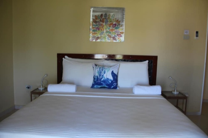 Imagen de la habitación del Hotel Reef Beach Resort. Foto 29