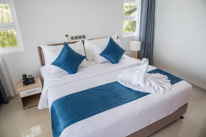 Imagen de la habitación del Hotel Reef Edge Thulusdhoo. Foto 2