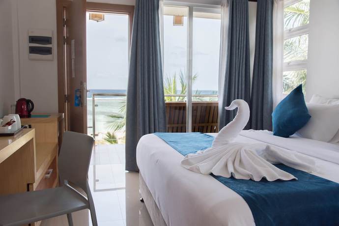 Imagen de la habitación del Hotel Reef Edge Thulusdhoo. Foto 6