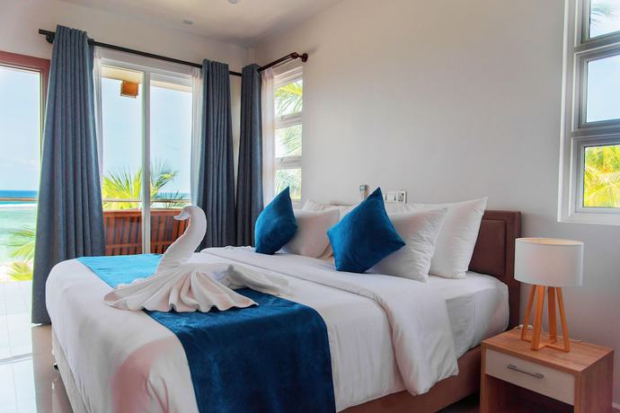 Imagen de la habitación del Hotel Reef Edge Thulusdhoo. Foto 11
