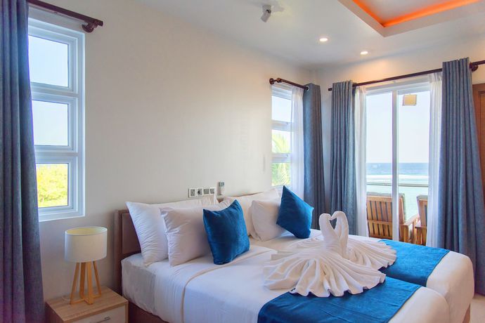 Imagen de la habitación del Hotel Reef Edge Thulusdhoo. Foto 18
