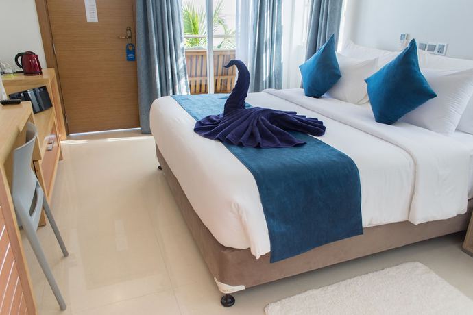 Imagen de la habitación del Hotel Reef Edge Thulusdhoo. Foto 19