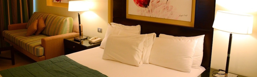 Imagen de la habitación del Hotel Reef Oasis Blue Bay Resort. Foto 2