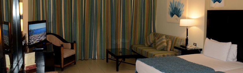 Imagen de la habitación del Hotel Reef Oasis Blue Bay Resort. Foto 6