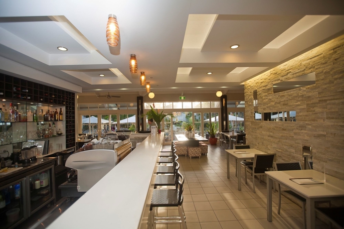 Imagen del bar/restaurante del Hotel Reef Resort Villas Port Douglas. Foto 5