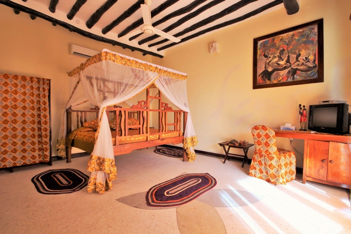 Imagen de la habitación del Hotel Reef and Beach Resort. Foto 3