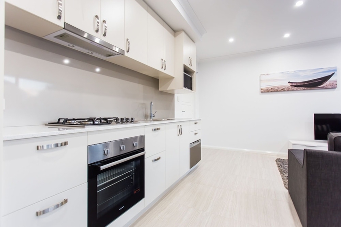 Imagen de la habitación del Hotel Reflections By Rockingham Apartments. Foto 2