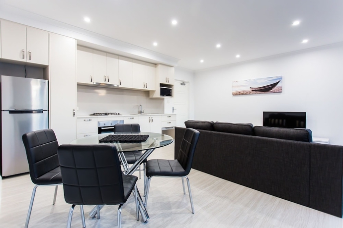 Imagen de la habitación del Hotel Reflections By Rockingham Apartments. Foto 9