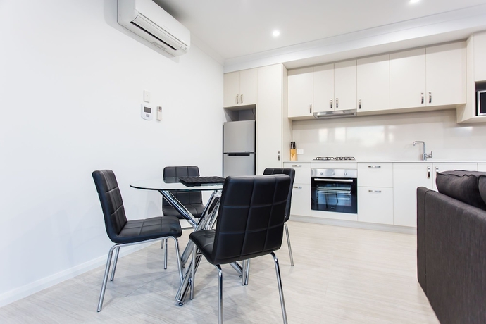 Imagen de la habitación del Hotel Reflections By Rockingham Apartments. Foto 11