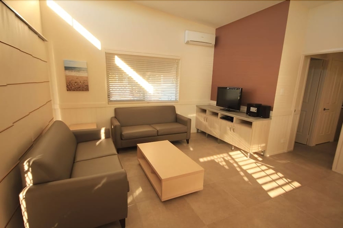 Imagen de la habitación del Hotel Reflections Holiday Parks Urunga. Foto 9
