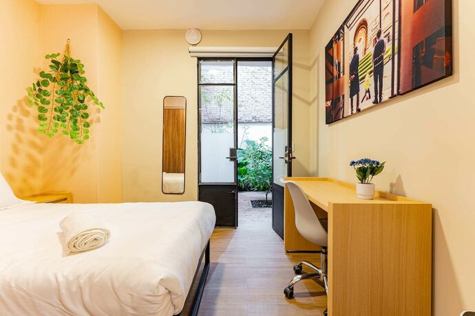 Imagen de la habitación del Hotel Reforma Casa Danubio Suites by VH. Foto 19