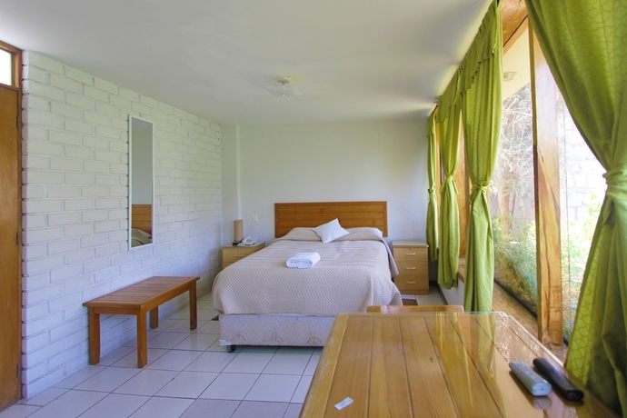 Imagen de la habitación del Hotel Refugio Ecol&oacute;gico. Foto 8