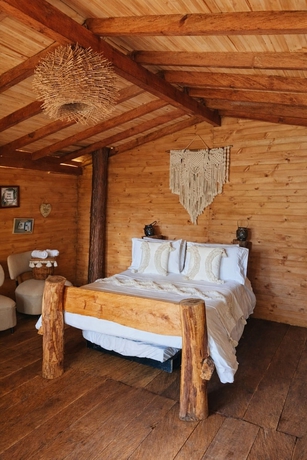 Imagen de la habitación del Hotel Refugio Natural - Guarne - Caba&ntilde;as Ecol&oacute;gicas con Jacuzzi e hidromasaje. Foto 7