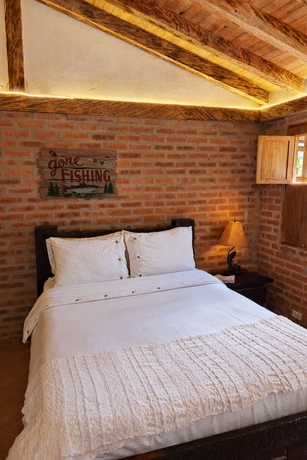 Imagen de la habitación del Hotel Refugio Natural - Guarne - Caba&ntilde;as Ecol&oacute;gicas con Jacuzzi e hidromasaje. Foto 9