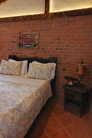 Imagen de la habitación del Hotel Refugio Natural - Guarne - Caba&ntilde;as Ecol&oacute;gicas con Jacuzzi e hidromasaje. Foto 13