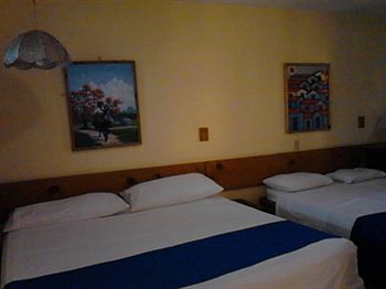 Imagen de la habitación del Hotel Refugio Neptuno's. Foto 6