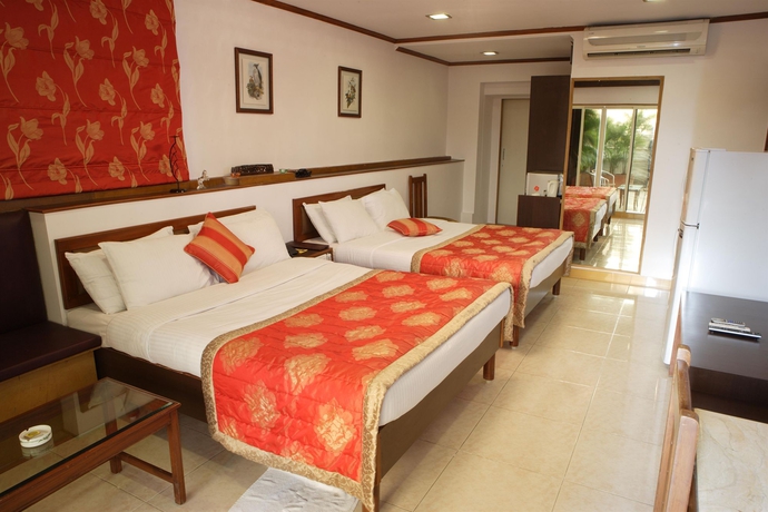 Imagen de la habitación del Hotel Regal Enclave. Foto 8