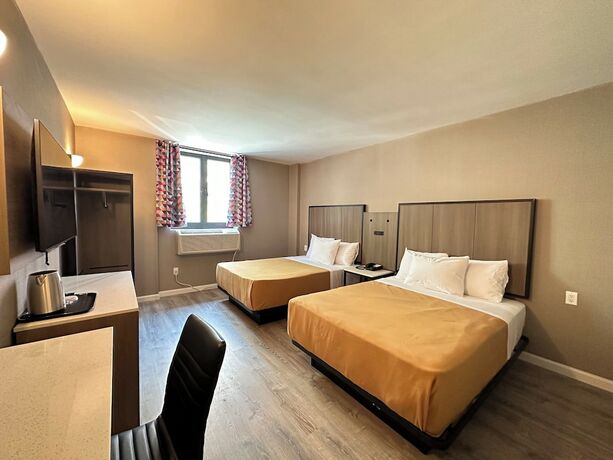 Imagen de la habitación del Hotel Regal Inn and Suites New York LaGuardia. Foto 18