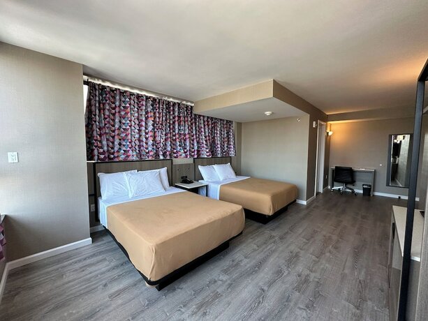 Imagen de la habitación del Hotel Regal Inn and Suites New York LaGuardia. Foto 19