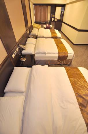 Imagen de la habitación del Hotel Regal International Hotel. Foto 2