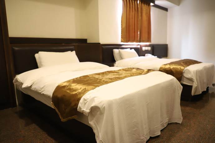 Imagen de la habitación del Hotel Regal International Hotel. Foto 4