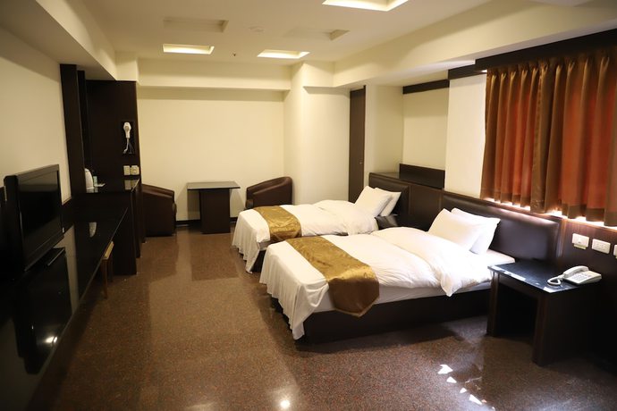 Imagen de la habitación del Hotel Regal International Hotel. Foto 5