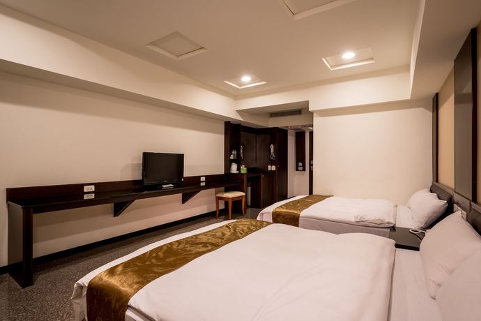 Imagen de la habitación del Hotel Regal International Hotel. Foto 6