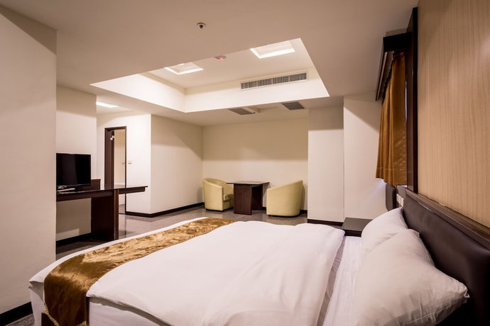 Imagen de la habitación del Hotel Regal International Hotel. Foto 8