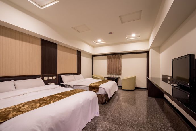 Imagen de la habitación del Hotel Regal International Hotel. Foto 10