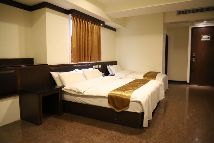 Imagen de la habitación del Hotel Regal International Hotel. Foto 11