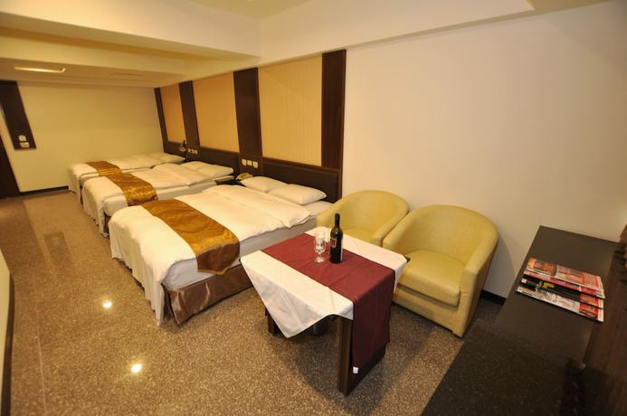 Imagen de la habitación del Hotel Regal International Hotel. Foto 13