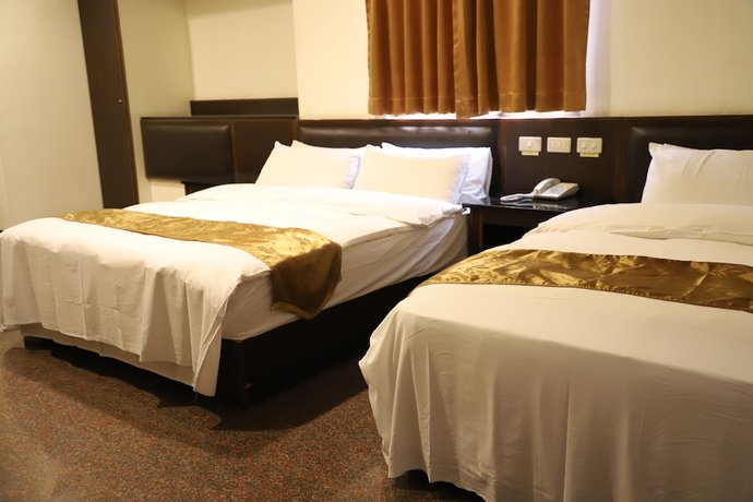 Imagen de la habitación del Hotel Regal International Hotel. Foto 14