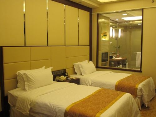 Imagen de la habitación del Hotel Regal Kangbo. Foto 10