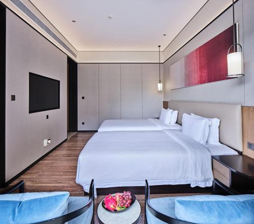 Imagen de la habitación del Hotel Regal Palace DeRUCCI Resort, Huizhou. Foto 12