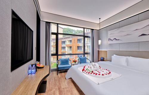 Imagen de la habitación del Hotel Regal Palace DeRUCCI Resort, Huizhou. Foto 15