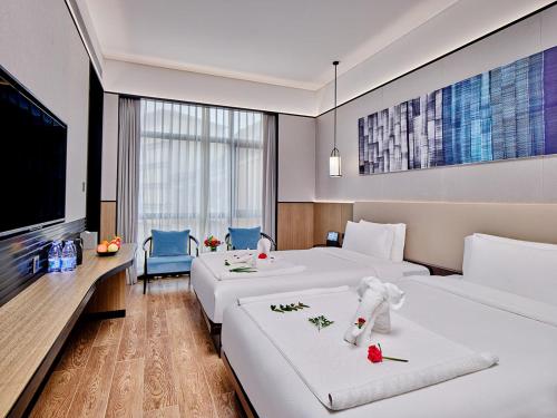 Imagen de la habitación del Hotel Regal Palace DeRUCCI Resort, Huizhou. Foto 16