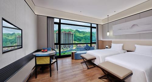 Imagen de la habitación del Hotel Regal Palace DeRUCCI Resort, Huizhou. Foto 18