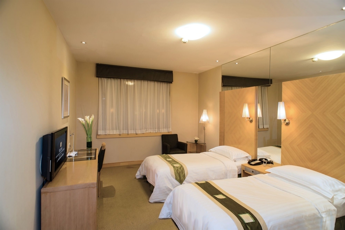 Imagen de la habitación del Hotel Regal Shanghai East Asia. Foto 4