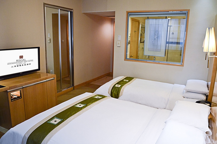 Imagen de la habitación del Hotel Regal Shanghai East Asia. Foto 6