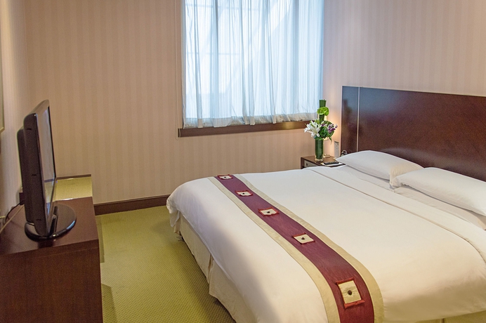 Imagen de la habitación del Hotel Regal Shanghai East Asia. Foto 13