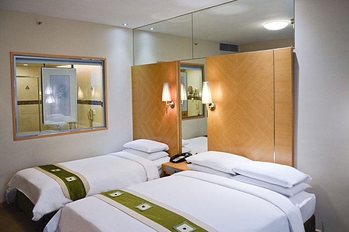 Imagen de la habitación del Hotel Regal Shanghai East Asia. Foto 15