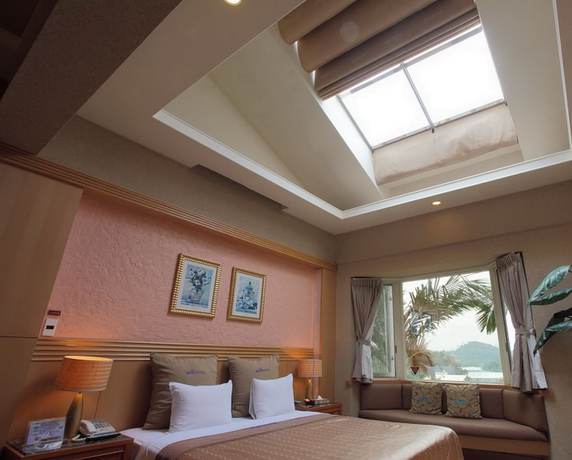 Imagen de la habitación del Hotel Regale Villa. Foto 16