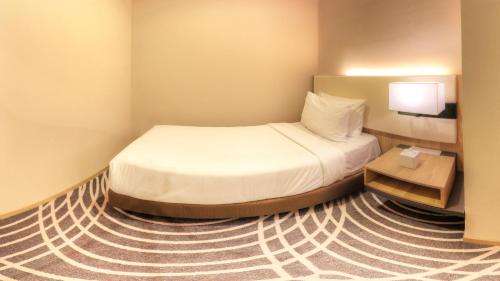 Imagen de la habitación del Hotel Regalia Upper View. Foto 15